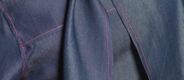 Denim couture con impunture a contrasto